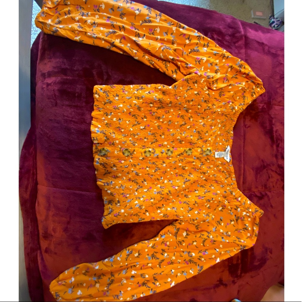 Orange long sleeve with floral design
